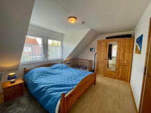 Postel nebo postele na pokoji v ubytování Möwennest