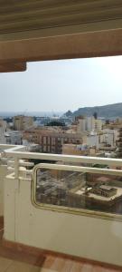 a view of a city from a window at Fantástico ático en el centro de Almería in Almería