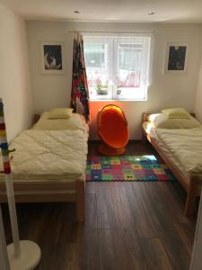 Postel nebo postele na pokoji v ubytování Vila Juliana