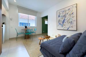 Posezení v ubytování Incrível localização no Leblon + 20 fotografií