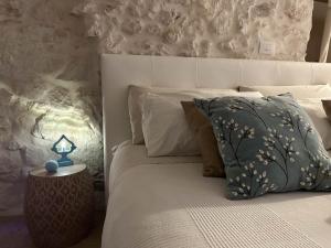 Posteľ alebo postele v izbe v ubytovaní Bianco Calce - Ostuni