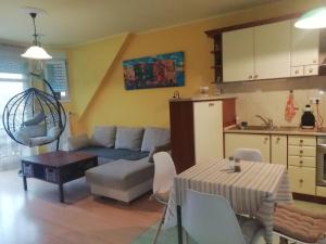 Kuchyň nebo kuchyňský kout v ubytování GingerBED Apartman