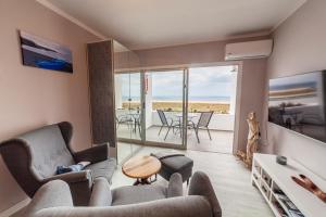 TV a/nebo společenská místnost v ubytování Amazing Luxury Apartment, La Casa del Corazon