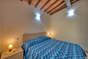 Voodi või voodid majutusasutuse La Casina di Alan - Goelba toas