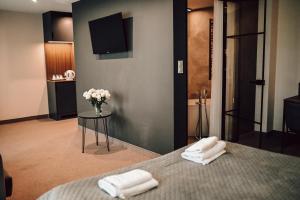Posteľ alebo postele v izbe v ubytovaní Rytebłota Resort & Spa