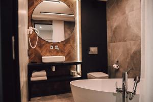 Kúpeľňa v ubytovaní Rytebłota Resort & Spa