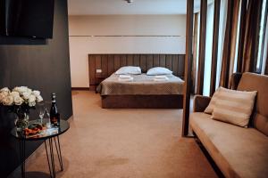 Posteľ alebo postele v izbe v ubytovaní Rytebłota Resort & Spa