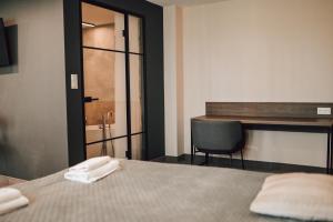 Posteľ alebo postele v izbe v ubytovaní Rytebłota Resort & Spa