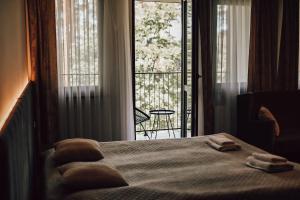 Posteľ alebo postele v izbe v ubytovaní Rytebłota Resort & Spa