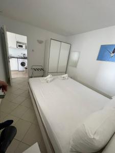 เตียงในห้องที่ Apartment A2 - Prvi zal