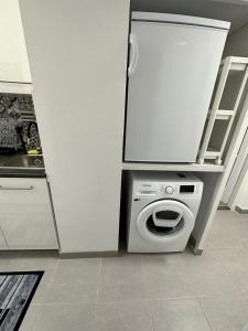 Kuchyňa alebo kuchynka v ubytovaní Sóstó Forest Apartman