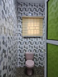 Et badeværelse på 247 City Apartment - Home away from home