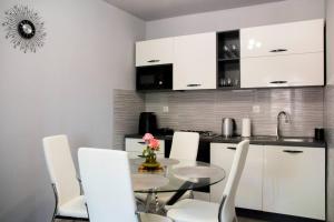 Kuchyň nebo kuchyňský kout v ubytování Apartment Bruna
