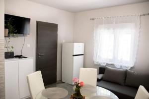 TV a/nebo společenská místnost v ubytování Apartment Bruna