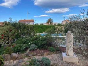 Vườn quanh Le Papounet Appartement - Maison de 150m2 à 500m de la plage et du centre ville