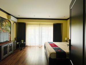Postel nebo postele na pokoji v ubytování Moonlight Hotel Sa Pa