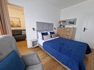 Posteľ alebo postele v izbe v ubytovaní P&A APARTAMENT