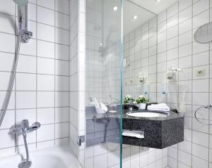 Koupelna v ubytování Sachsenpark-Hotel