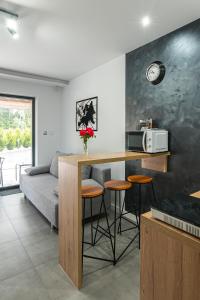 Kuchyňa alebo kuchynka v ubytovaní Bianco Apartamenty Laskowa - Zator