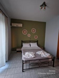 Postel nebo postele na pokoji v ubytování AURELEA ex Filianthi + 8 fotografií