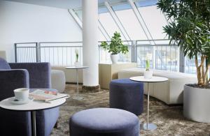 Posezení v ubytování Sachsenpark-Hotel