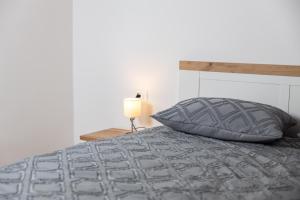 Postel nebo postele na pokoji v ubytování Apartment Div