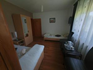 Posteľ alebo postele v izbe v ubytovaní Stari mlin