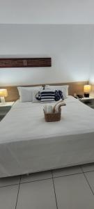 Posteľ alebo postele v izbe v ubytovaní ILOA Residence Flat Alagoas