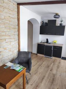 Kuchyň nebo kuchyňský kout v ubytování Ferienappartement 2 beim Strandbad