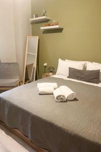 Posteľ alebo postele v izbe v ubytovaní 21st Street Comfy Studio