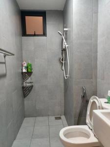 a bathroom with a shower with a toilet and a sink at M Vertica kl 3r2b 7 pax cosy house 3min mrt, sunway velocity mall, 8min ikea in Kuala Lumpur