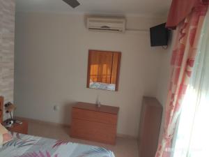 Cama o camas de una habitación en Apartamento VILLA INÉS parking y wifi gratis
