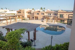 a view of a swimming pool in a building at Private Villa 115 in Gated Community Pet-friendly in Cabo San Lucas