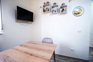 TV a/nebo společenská místnost v ubytování Casa del Mister