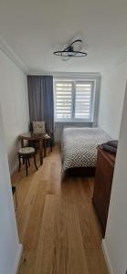 Ένα ή περισσότερα κρεβάτια σε δωμάτιο στο Arma Design Apartment 2 Bedrooms