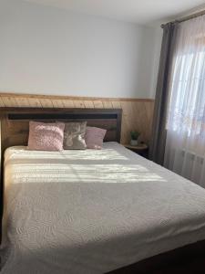 Posteľ alebo postele v izbe v ubytovaní Pokoje Gościnne Monika