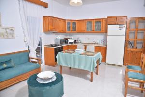 Kuchyň nebo kuchyňský kout v ubytování ZeusPlace Konaki House Leptokarya