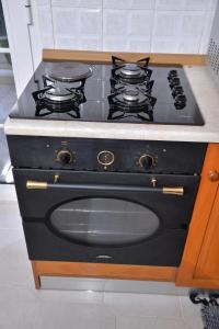 Kuchyň nebo kuchyňský kout v ubytování ZeusPlace Konaki House Leptokarya