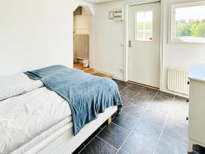 Postel nebo postele na pokoji v ubytování Holiday home TINGSRYD