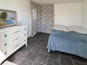 Postel nebo postele na pokoji v ubytování Holiday home TINGSRYD