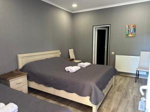 Voodi või voodid majutusasutuse Hotel Vardzia Terrace toas