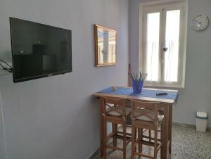 TV a/nebo společenská místnost v ubytování Bilocale per vacanze a Vada
