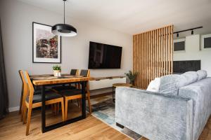 Χώρος καθιστικού στο Apartament POD LASEM