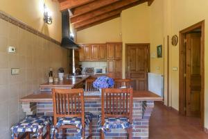 Кухня или мини-кухня в Apartamentos Rurales El Cuetu
