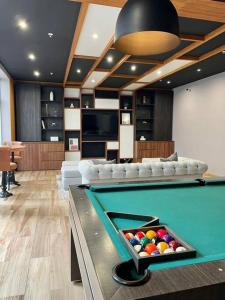 a lobby with a pool table in a room at Colorfull Studio in Barranco in Lima