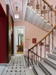 a staircase in a home with pink walls at Mr Cas Hotels Taksim - Special Category in Istanbul