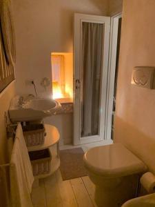 a bathroom with a sink and a toilet at Camogli in Love La casetta sul mare in Camogli