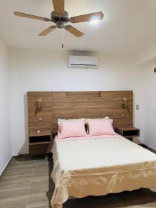 Postel nebo postele na pokoji v ubytování Hotel Paso Realce