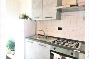 Kuhinja oz. manjša kuhinja v nastanitvi Affittacamere Donna Rosa Cava dei Tirreni