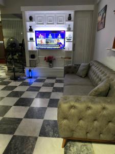 TV a/nebo společenská místnost v ubytování Soykan Hotel